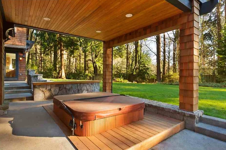 outdoor patio with hot tub