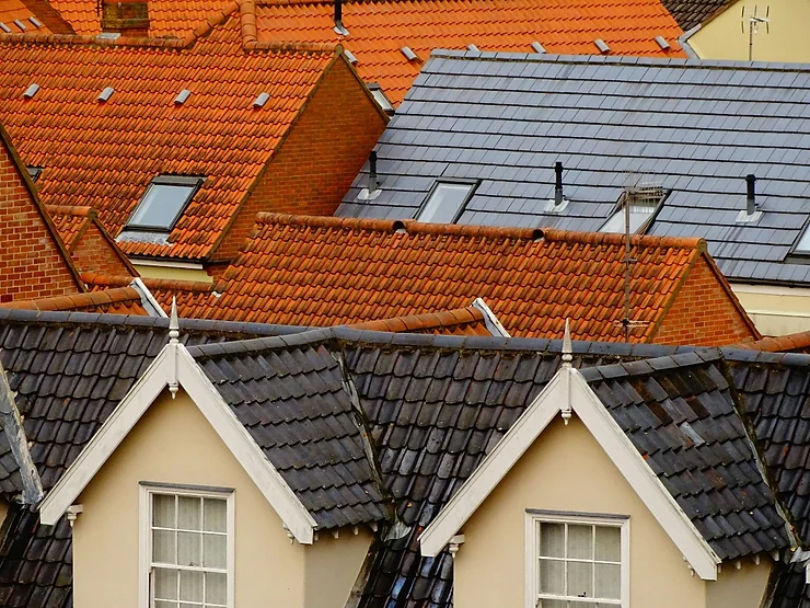 image of three roofs on homes